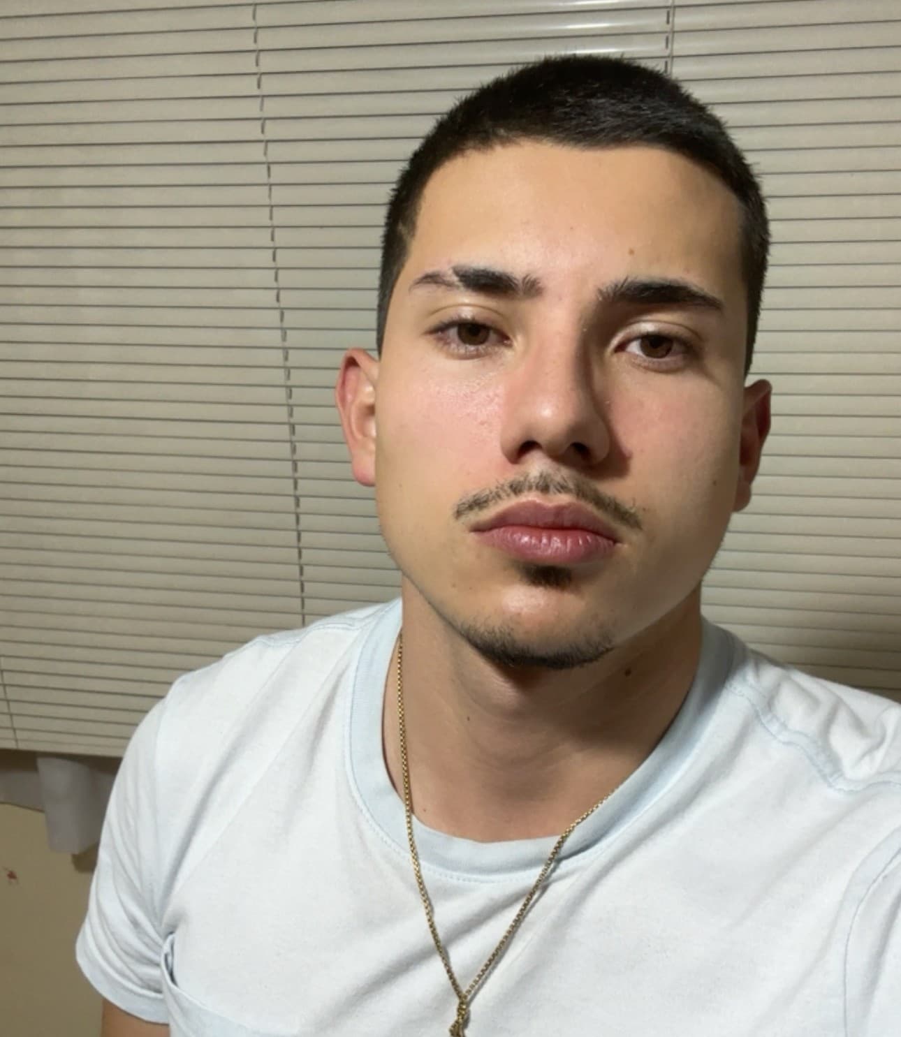 Andres Bonilla in a Tesla roadster