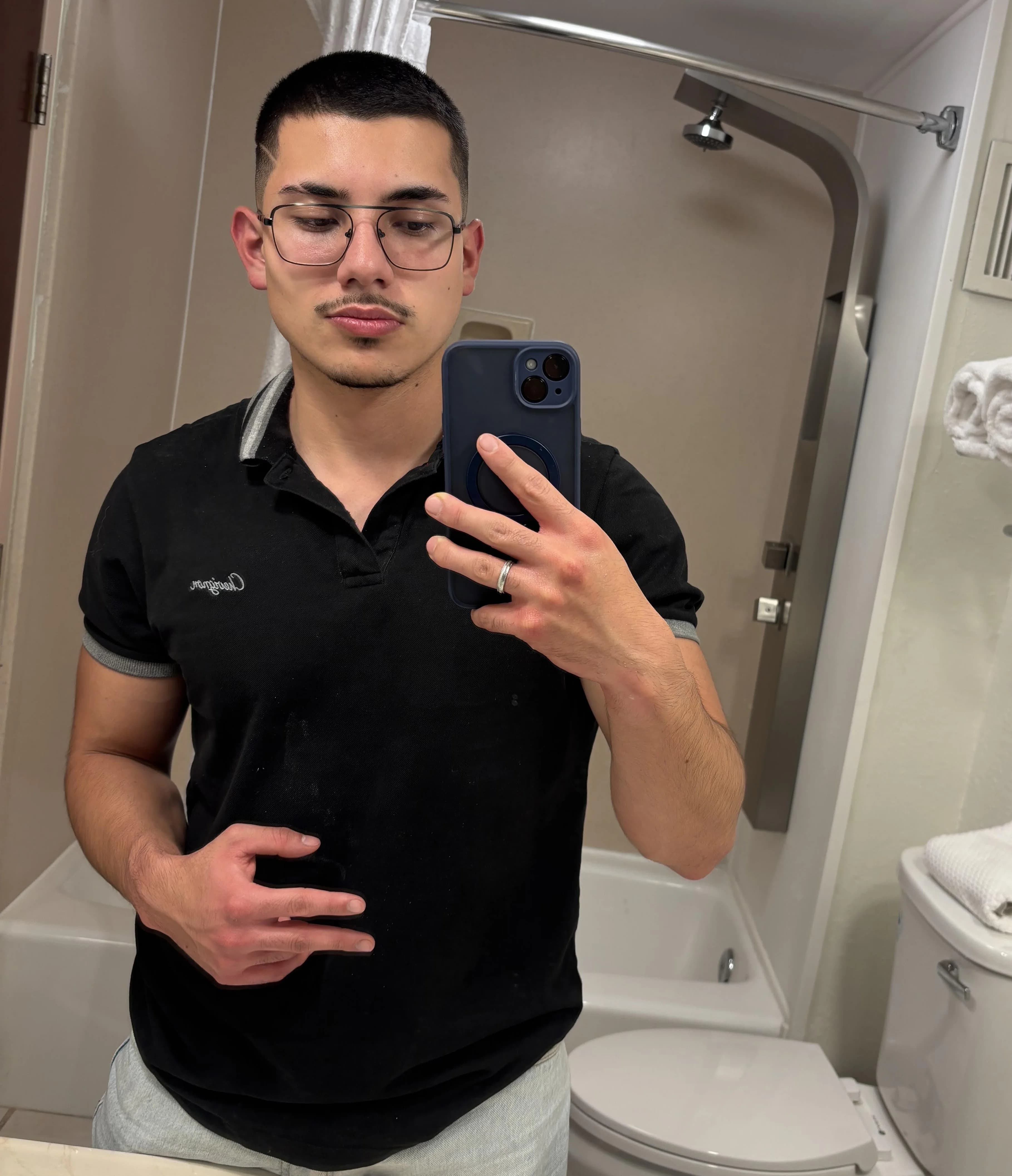 Andres Bonilla in a Tesla roadster